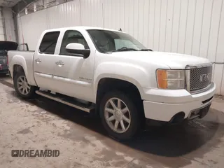2010 GMC Sierra 1500 Denali z VIN 3GTRKXE2XAG216102, wystawiony jako IAAI lot #41052687 z przebiegiem 203 146 mil mil oraz . Historia ofert i sprzedaży dostępna na DreamBid. Obrazek 1.