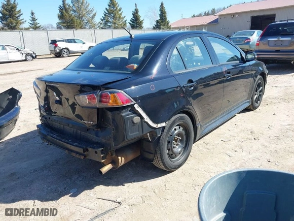 2017 Mitsubishi Lancer ES with VIN JA32U2FU4HU015140, listed as a IAAI auction lot 41890521 with 267,436 mi miles. Bid and sale history available at carsss.com. Image 4.