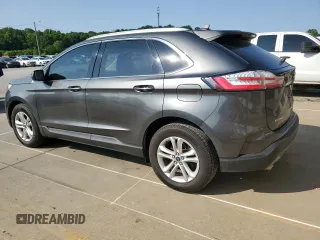 2020 Ford Edge SEL с VIN 2FMPK3J97LBB58552, выставлен на аукционе Copart как лот 58472995 с пробегом 71 387 миль миль и Списание • Salvage title. История ставок и продаж доступна на DreamBid. Изображение 2.