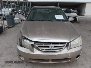 2004 Kia Spectra LX with VIN KNAFE121245064294, listed as a IAAI auction lot 41424241 with 110,136 mi miles. Bid and sale history available at carsss.com. Image 12.