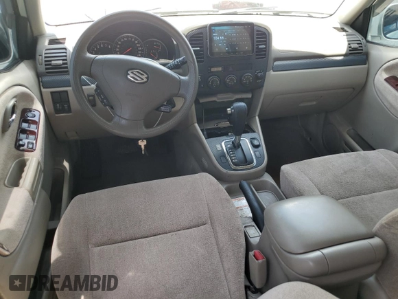 2004 Suzuki XL7 LX with VIN JS3TX92V444107106, listed as a Copart auction lot 62322035 with 94,380 mi miles and Salvage title. Bid and sale history available at DreamBid. Image 8.
