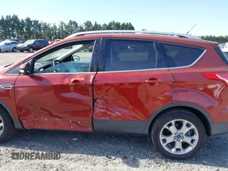 2016 Ford Escape Titanium with VIN 1FMCU9JX9GUA16892, listed as a IAAI auction lot 42110986 with 87,775 mi miles and . Bid and sale history available at DreamBid. Image 14.