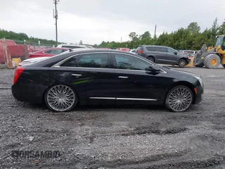 2014 Cadillac XTS Luxury z VIN 2G61N5S38E9292684, wystawiony jako IAAI lot #41842596 z przebiegiem 130 318 mil mil oraz . Historia ofert i sprzedaży dostępna na DreamBid. Obrazek 13.