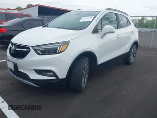 2019 Buick Encore Essence with VIN KL4CJGSM2KB876329, listed as a IAAI auction lot 42101397 with 84,020 mi miles. Bid and sale history available at carsss.com. Image 2.