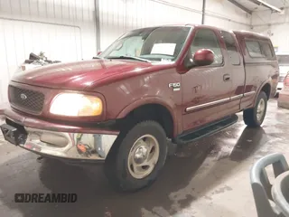 1998 Ford F-150 with VIN 1FTZX18W8WKA19037, listed as a IAAI auction lot 40977819 with 137,119 mi miles and . Bid and sale history available at DreamBid. Image 2.