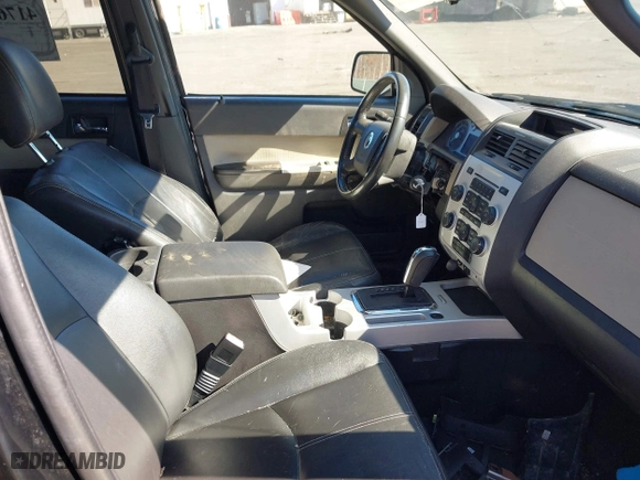 2009 Mercury Mariner with VIN 4M2CU91G99KJ12339, listed as a IAAI auction lot 41760508 with 176,421 mi miles. Bid and sale history available at carsss.com. Image 5.