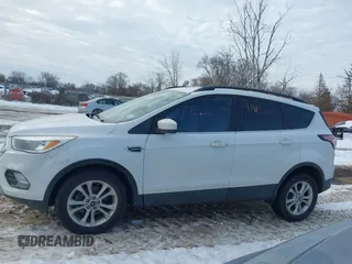 2018 Ford Escape SE with VIN 1FMCU0GD1JUC48757, listed as a IAAI auction lot 41631583 with 80,700 mi miles. Bid and sale history available at carsss.com. Image 14.