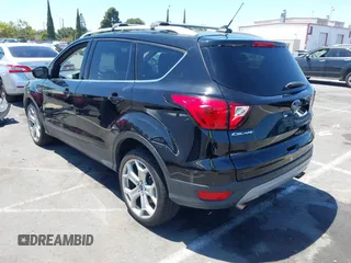 2019 Ford Escape Titanium with VIN 1FMCU9J98KUA21480, listed as a IAAI auction lot 42698275 with 65,478 mi miles and . Bid and sale history available at DreamBid. Image 3.