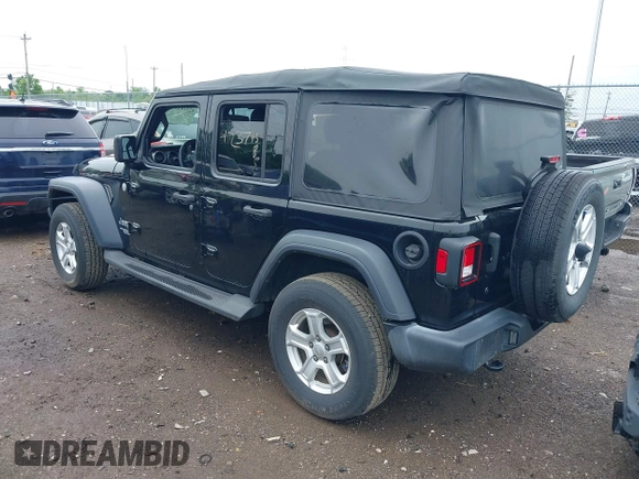 2018 Jeep Wrangler Unlimited Sport S with VIN 1C4HJXDG3JW150232, listed as a IAAI auction lot 42379385 with 60,679 mi miles and . Bid and sale history available at DreamBid. Image 3.