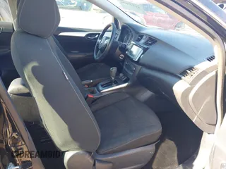 2019 Nissan Sentra S z VIN 3N1AB7AP1KY456992, wystawiony jako IAAI lot #41237654 z przebiegiem 88 099 mil mil oraz . Historia ofert i sprzedaży dostępna na DreamBid. Obrazek 5.