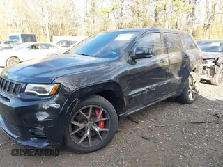 2017 Jeep Grand Cherokee SRT with VIN 1C4RJFDJ3HC694736, listed as a IAAI auction lot 41292771 with 79,966 mi miles. Bid and sale history available at carsss.com. Image 6.