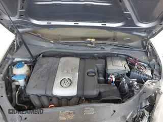 2009 Volkswagen Rabbit S with VIN WVWAA71K99W073355, listed as a IAAI auction lot 41459740 with 124,952 mi miles. Bid and sale history available at carsss.com. Image 10.