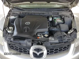 2009 Mazda CX-7 Grand Touring z VIN JM3ER29L990226899, wystawiony jako Copart lot #50071505 z przebiegiem 167 124 mil mil oraz Szkoda całkowita • Salvage title. Historia ofert i sprzedaży dostępna na DreamBid. Obrazek 11.