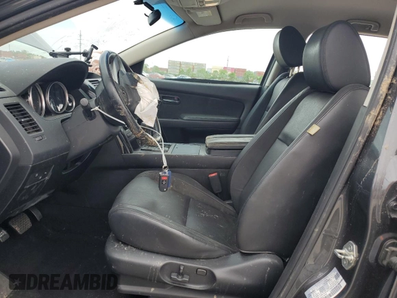 2014 Mazda CX-9 Touring with VIN JM3TB2CA7E0444918, listed as a Copart auction lot 57801165 with 116,638 mi miles and Salvage title. Bid and sale history available at DreamBid. Image 7.