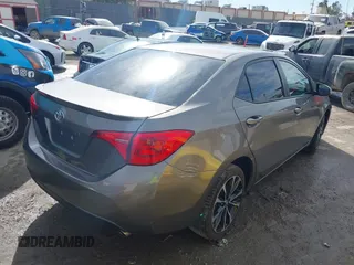 2017 Toyota Corolla L z VIN 5YFBURHE5HP730912, wystawiony jako IAAI lot #41610019 z przebiegiem 61 440 mil mil oraz . Historia ofert i sprzedaży dostępna na DreamBid. Obrazek 4.