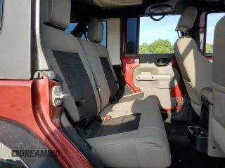 2010 Jeep Wrangler Unlimited Sahara with VIN 1J4BA5H13AL141851, listed as a Copart auction lot 63486504 with 0 mi miles and Salvage Title. Bid and sale history available at carsss.com. Image 10.