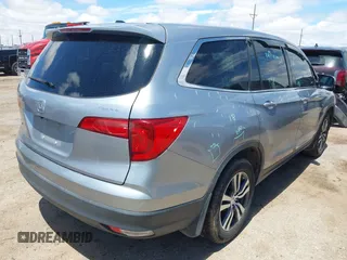 2018 Honda Pilot EX-L with VIN 5FNYF5H61JB008134, listed as a IAAI auction lot 42193142 with 100,254 mi miles and . Bid and sale history available at DreamBid. Image 4.