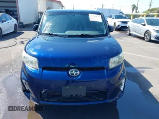 2014 Scion xB with VIN JTLZE4FE6EJ057604, listed as a IAAI auction lot 41528031 with 48,403 mi miles. Bid and sale history available at carsss.com. Image 12.