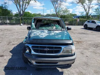 1998 Ford Explorer XLT z VIN 1FMZU32EXWUC84059, wystawiony jako IAAI lot #42260114 z przebiegiem 173 383 mil mil oraz . Historia ofert i sprzedaży dostępna na DreamBid. Obrazek 6.