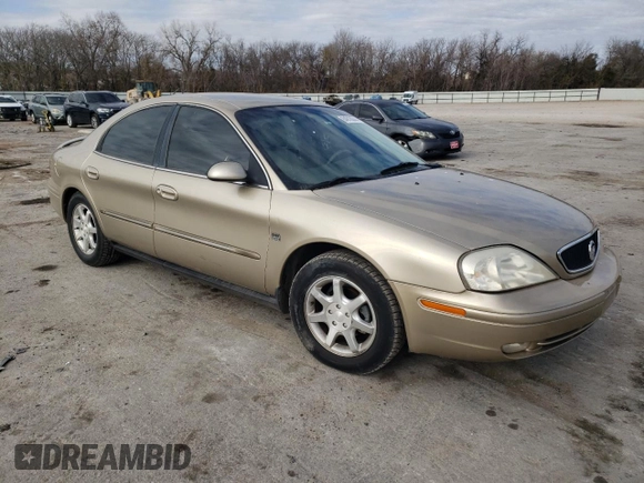 2000 Mercury Sable LS Premium z VIN 1MEFM55S0YA621927, wystawiony jako Copart lot #87052444 z przebiegiem 34 930 mil mil oraz Szkoda całkowita • Salvage title. Historia ofert i sprzedaży dostępna na DreamBid. Obrazek 4.