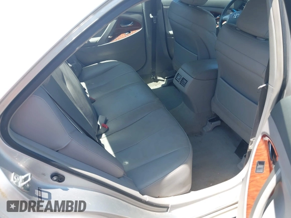 2009 Toyota Camry LE z VIN 4T1BK46K49U592233, wystawiony jako IAAI lot #42205847 z przebiegiem 141 226 mil mil oraz . Historia ofert i sprzedaży dostępna na DreamBid. Obrazek 8.