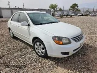 2009 Kia Spectra EX with VIN KNAFE221395611215, listed as a Copart auction lot 80164254 with 135,783 mi miles and Clean Title. Bid and sale history available at carsss.com. Image 1.