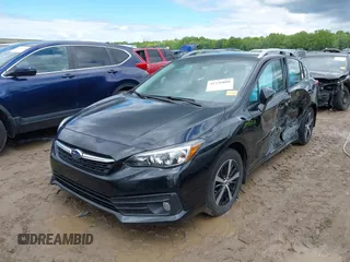 2022 Subaru Impreza Premium with VIN 4S3GTAV61N3726450, listed as a IAAI auction lot 42336888 with 51,052 mi miles and . Bid and sale history available at DreamBid. Image 2.