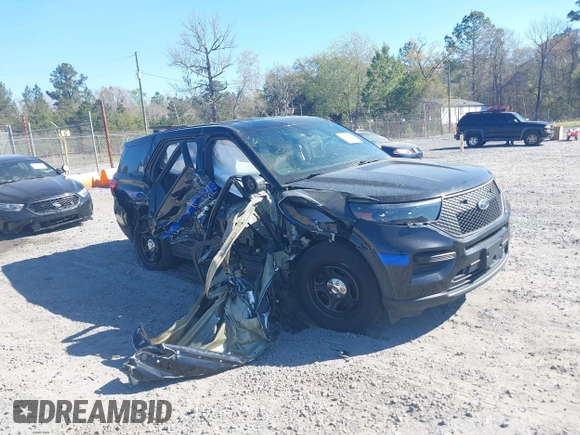 2021 Ford Police Interceptor Utility z VIN 1FM5K8AB0MGB98697, wystawiony jako IAAI lot #41877811 z przebiegiem 23 127 mil mil oraz . Historia ofert i sprzedaży dostępna na DreamBid. Obrazek 1.