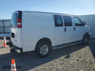 2022 GMC Savana Cargo Van with VIN 1GTW7AF76N1264390, listed as a Copart auction lot 83100184 with 23,313 mi miles and Salvage Title. Bid and sale history available at carsss.com. Image 3.