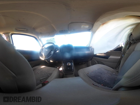 2010 Jeep Patriot Sport with VIN 1J4NF1GBXAD640562, listed as a IAAI auction lot 41869559 with 141,581 mi miles and . Bid and sale history available at DreamBid. Image 18.