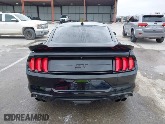 2021 Ford Mustang GT z VIN 1FA6P8CF2M5149643, wystawiony jako IAAI lot #41981794 z przebiegiem 57 345 mil mil oraz . Historia ofert i sprzedaży dostępna na DreamBid. Obrazek 16.