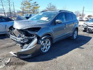 2013 Ford Escape SEL with VIN 1FMCU9H97DUD30608, listed as a IAAI auction lot 41800073 with 102,180 mi miles. Bid and sale history available at carsss.com. Image 17.
