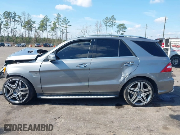 2013 Mercedes-Benz M ML 63 AMG with VIN 4JGDA7EB9DA155725, listed as a IAAI auction lot 41502675 with 64,849 mi miles. Bid and sale history available at carsss.com. Image 13.