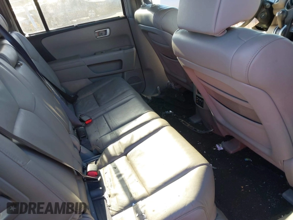 2009 Honda Pilot Touring with VIN 5FNYF48979B008851, listed as a IAAI auction lot 41252736 with 183,292 mi miles and . Bid and sale history available at carsss.com. Image 8.