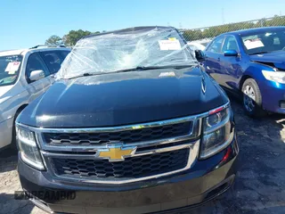 2015 Chevrolet Tahoe Commercial with VIN 1GNLC2EC3FR280365, listed as a IAAI auction lot 40580594 with 195,740 mi miles and . Bid and sale history available at DreamBid. Image 12.