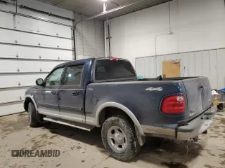 2002 Ford F-150 XLT with VIN 1FTRW08L02KE06257, listed as a Copart auction lot 45004605 with 189,003 mi miles and Salvage Title. Bid and sale history available at carsss.com. Image 2.