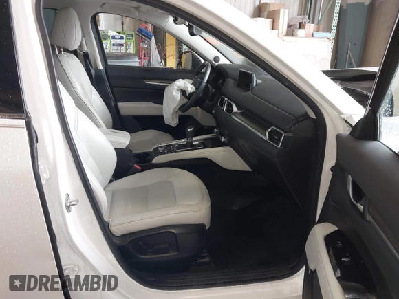 2020 Mazda CX-5 Grand Touring with VIN JM3KFADMXL0742038, listed as a IAAI auction lot 42292400 with 68,339 mi miles and . Bid and sale history available at DreamBid. Image 5.