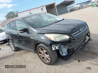 2013 Ford Escape SEL with VIN 1FMCU0H98DUD87055, listed as a IAAI auction lot 41208958 with 82,555 mi miles. Bid and sale history available at carsss.com. Image 1.