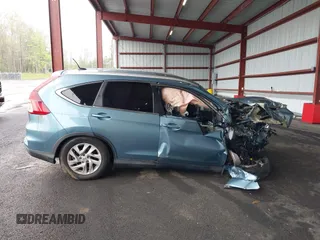 2015 Honda CR-V EX-L with VIN 2HKRM4H74FH664589, listed as a IAAI auction lot 42187907 with 94,096 mi miles. Bid and sale history available at carsss.com. Image 12.
