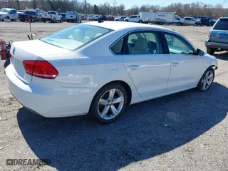 2012 Volkswagen Passat SE with VIN 1VWBP7A38CC030837, listed as a IAAI auction lot 41864669 with 169,816 mi miles. Bid and sale history available at carsss.com. Image 4.