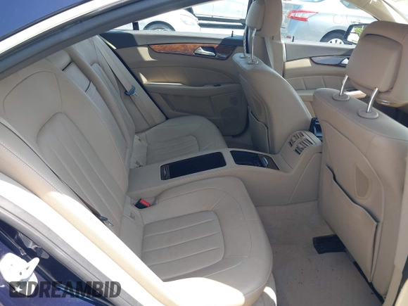 2014 Mercedes-Benz CLS 550 with VIN WDDLJ9BB9EA090821, listed as a IAAI auction lot 42582082 with 97,459 mi miles and . Bid and sale history available at DreamBid. Image 8.