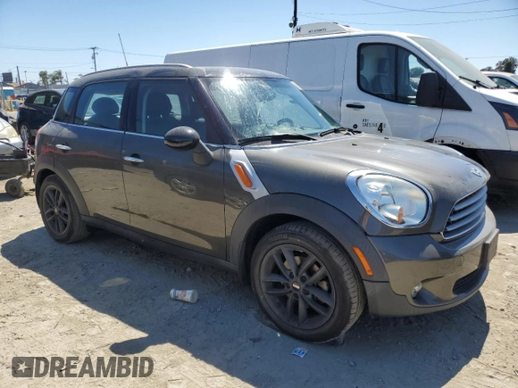 2014 MINI Countryman with VIN WMWZB3C54EWR39731, listed as a Copart auction lot 63635215 with 85,751 mi miles and Salvage title. Bid and sale history available at DreamBid. Image 4.