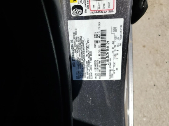 2012 Lincoln MKZ with VIN 3LNHL2GC6CR804129, listed as a Copart auction lot 49159795 with 105,188 mi miles and Salvage Title. Bid and sale history available at carsss.com. Image 14.