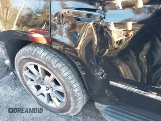 2016 GMC Yukon Denali with VIN 1GKS2CKJ2GR412201, listed as a IAAI auction lot 41185716 with 124,421 mi miles. Bid and sale history available at carsss.com. Image 19.