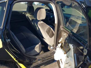 2011 Chevrolet Impala Police Police with VIN 2G1WD5EM6B1251953, listed as a IAAI auction lot 40972078 with 106,935 mi miles. Bid and sale history available at carsss.com. Image 8.