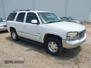2002 GMC Yukon SLT z VIN 1GKEK13Z02R262765, wystawiony jako IAAI lot #42398655 z przebiegiem 269 674 mil mil oraz . Historia ofert i sprzedaży dostępna na DreamBid. Obrazek 1.