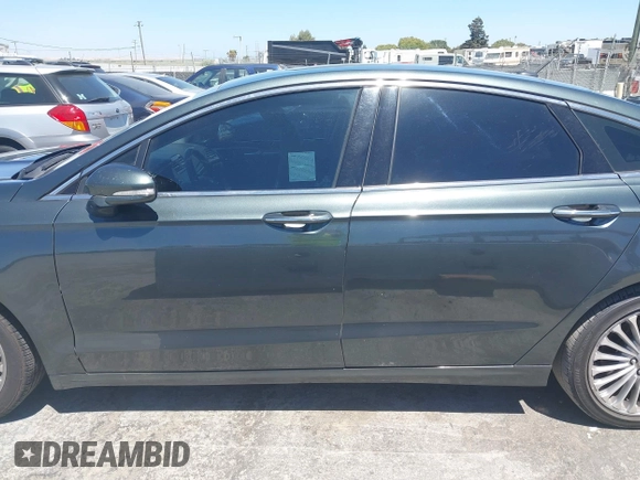 2016 Ford Fusion Titanium with VIN 3FA6P0K98GR196951, listed as a IAAI auction lot 42538508 with 186,298 mi miles and . Bid and sale history available at DreamBid. Image 14.