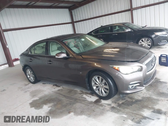 2015 Infiniti Q50 Premium z VIN JN1BV7AR0FM393387, wystawiony jako IAAI lot #42257850 z przebiegiem 176 436 mil mil oraz . Historia ofert i sprzedaży dostępna na DreamBid. Obrazek 13.