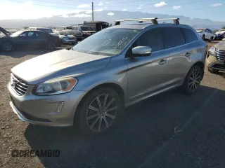 2015 Volvo XC60 T5 Drive-E Premier with VIN YV440MDK3F2759501, listed as a Copart auction lot 58100895 with 98,084 mi miles and Salvage title. Bid and sale history available at DreamBid. Image 1.