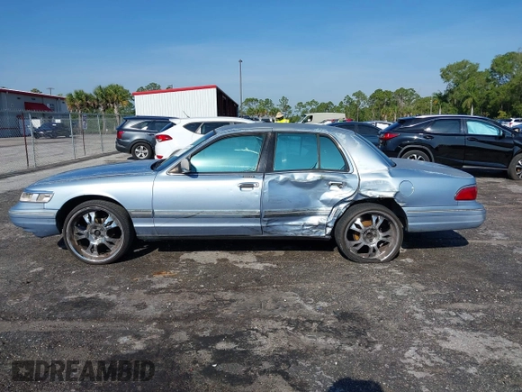 1997 Mercury Grand Marquis LS with VIN 2MELM75W7VX708034, listed as a IAAI auction lot 41878938 with 197,818 mi miles and . Bid and sale history available at DreamBid. Image 14.